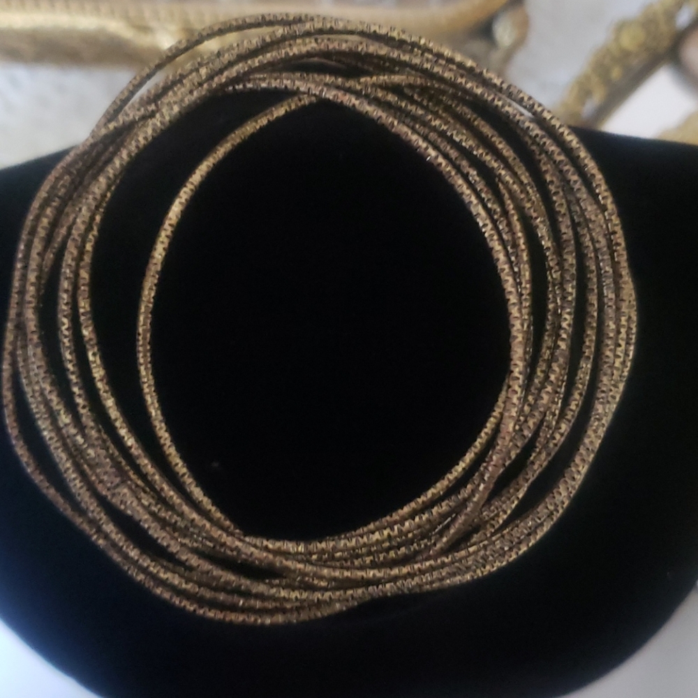 10 thin brass colour bangle bracelets